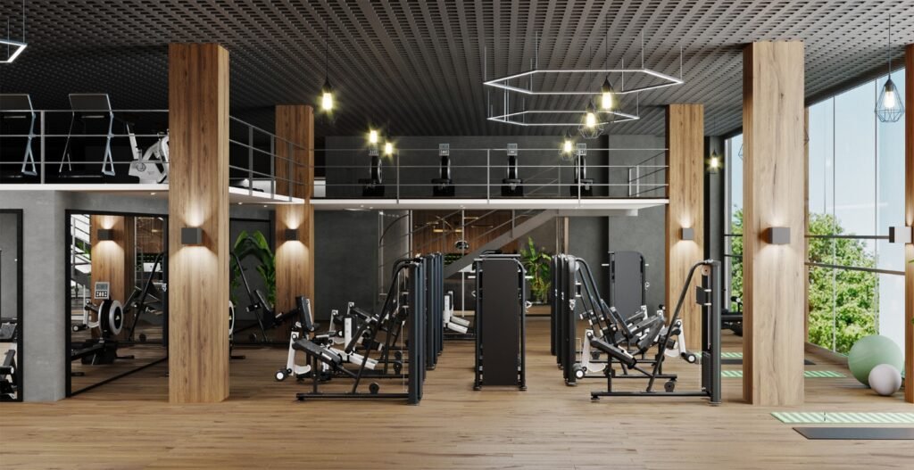 Large commercial gym interior with multiple strength machines and open training space, Studio OS Commercial