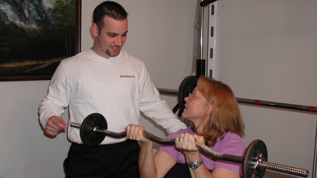 HireATrainer.com trainer conducting an in-home personal training session with a female client in Dallas, Texas